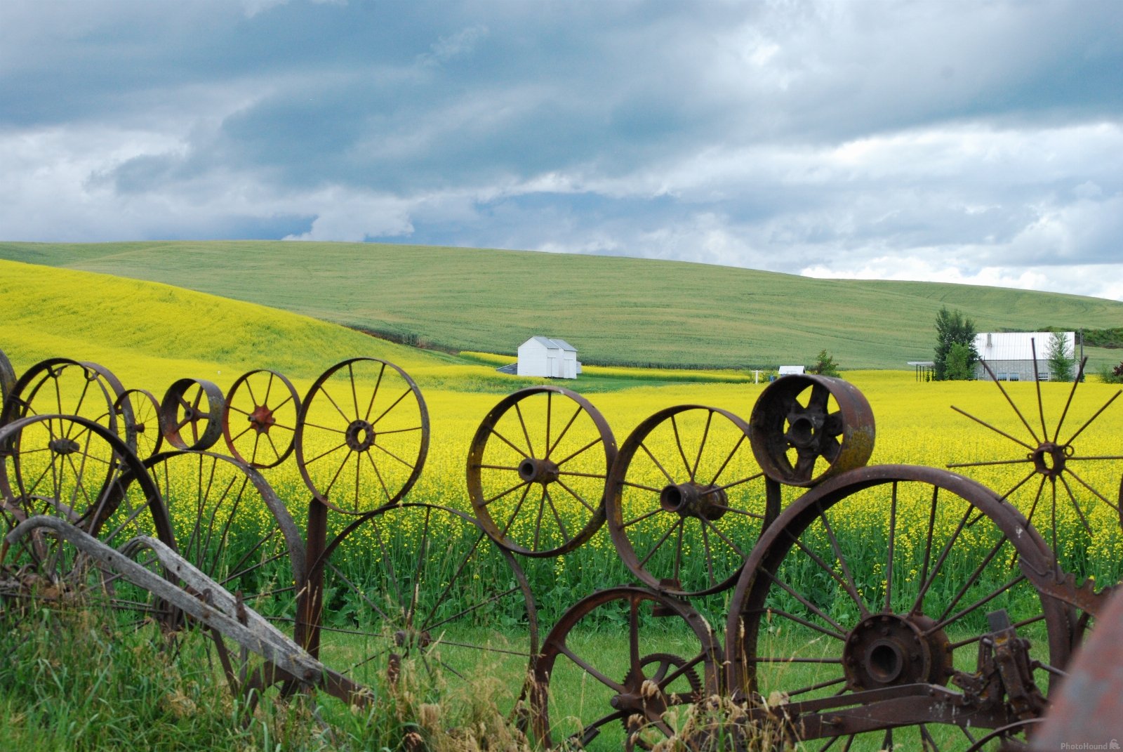Image of Dahmen Barn and Wagon Wheel Fence by Rod Schwartz