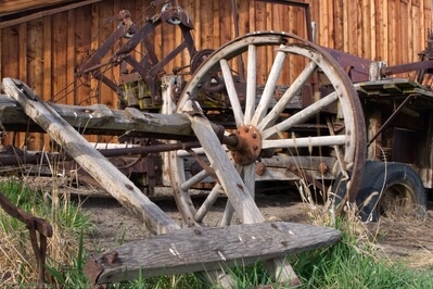 Old farm equipment near the historic schoolhouse site