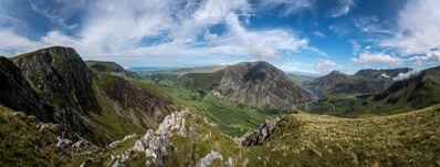 Large panorama from the Ogwen valley on the right to the valley that leads out to Anglesey on the left.