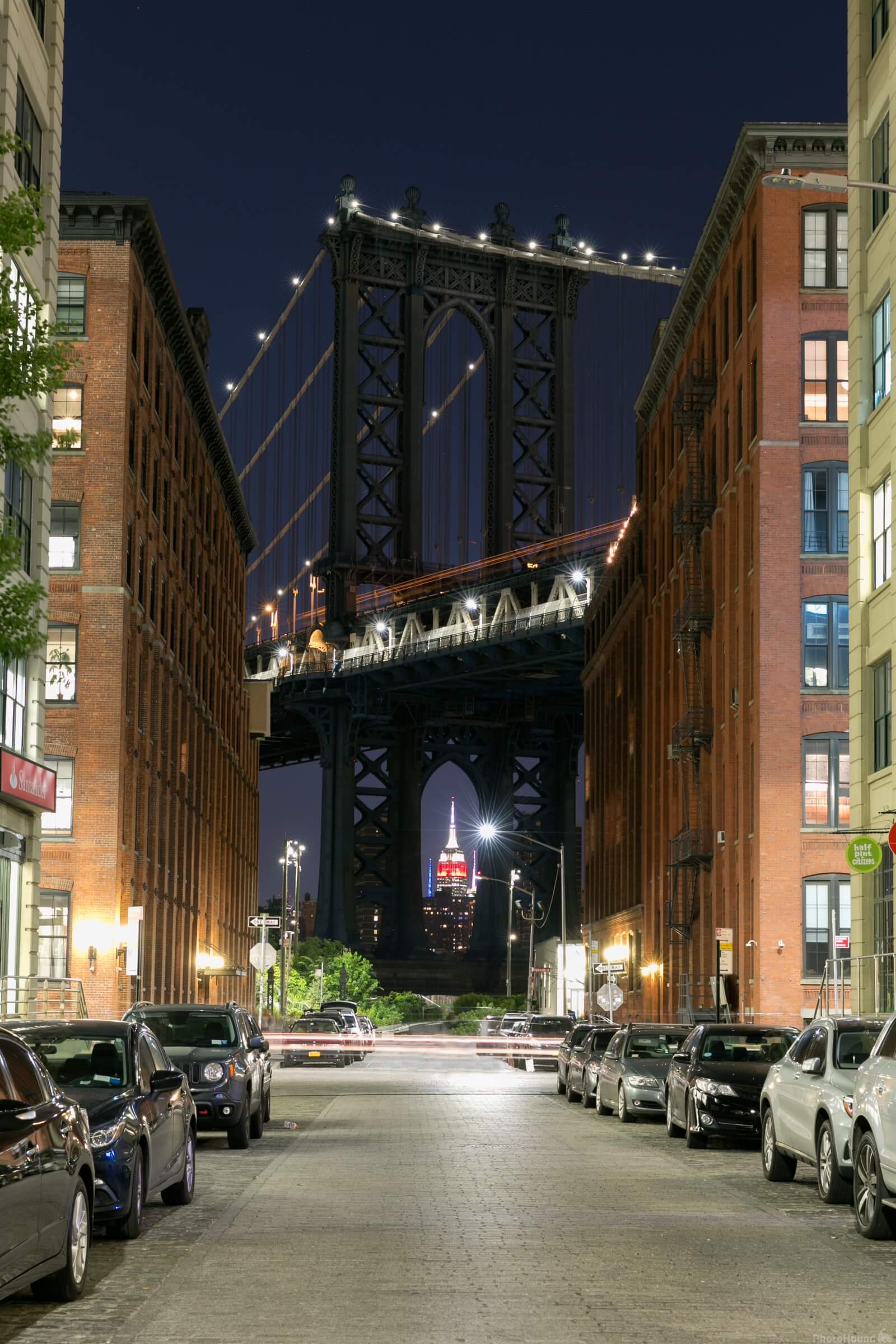 Image of Empire State Building view through the Manhattan Bridge by Jeff Martin
