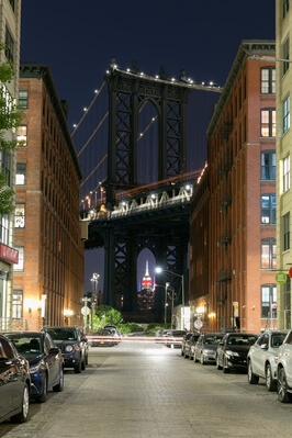 photos of New York City - Empire State Building view through the Manhattan Bridge