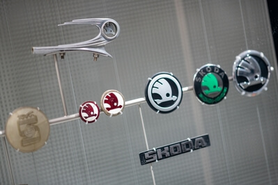 Škoda Museum, different logos of Škoda brand through the history