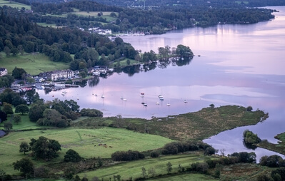 Telephoto shot of boats on Windermere at dawn