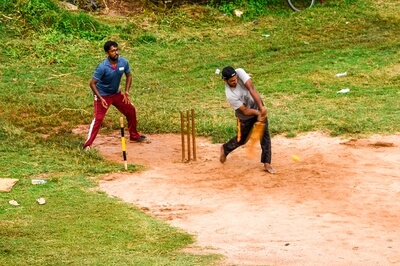 A game of cricket, the passion of Lankans, inside the Fort. 
