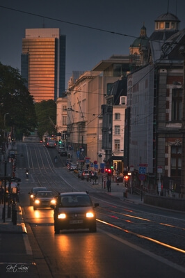 Regency street at Blue hour With Madou tower in the back capturing and reflecting the setting sun.