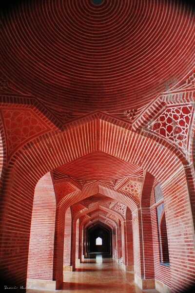 The Shah Jahan Mosque, also known as the Jamia Masjid of Thatta, is a 17th-century building that serves as the central mosque for the city of Thatta, in the Pakistani province of Sindh. The mosque is considered to have the most elaborate display of tile work in South Asia, and is also notable for its geometric brick work - a decorative element that is unusual for Mughal-period mosques. It was built during the reign of Mughal emperor Shah Jahan, who bestowed it to the city as a token of gratitude, and is heavily influenced by Central Asian architecture - a reflection of Shah Jahan's campaigns near Samarkand shortly before the mosque was designed.