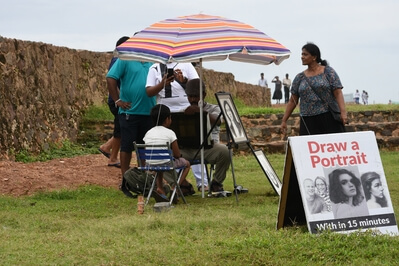 A portrait artist in Galle Fort