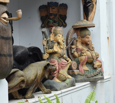 Carved images of deities and animals on display in Galle Fort