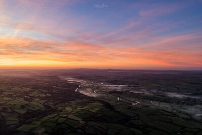 Sunset drone image of the valley below