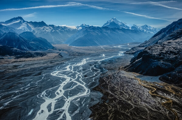 Braided river with Mt Cook in the background.
Taken from a helicopter.
