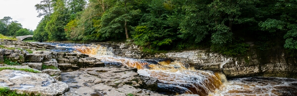 This panorama shot was taken hand held and is comprised of six single shots combined. It is difficult to get the extent of these falls into a single frame. This is a very beautiful location to test your photographic skills.