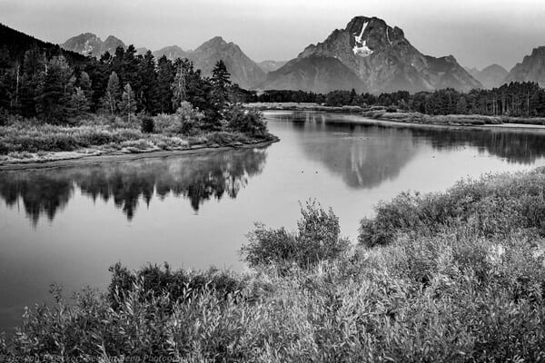 This image was shot shortly after sunrise on a day with thick with wildfire smoke. Significant post-processing in Lightroom and Photoshop, including conversion to black and white, was required to bring out the mountains. Shots taken during non-smoky days, particularly at sunrise, will provide superior results.