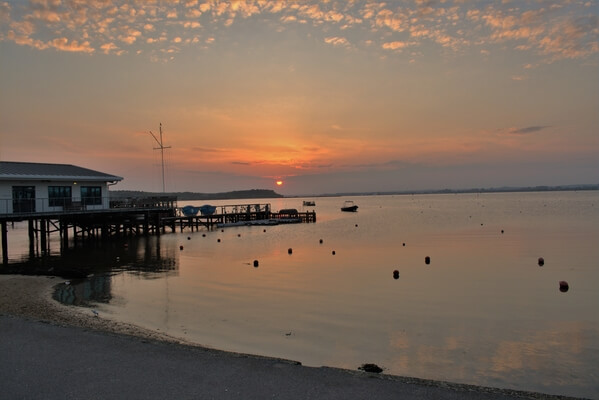Sandbanks Peninsular is known for its beautiful sunsets this image is taken at sunset.
