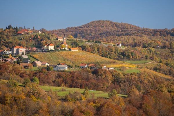Cerkev svete Ane (St Ana church) at Vidošiči village - a view in the distance
