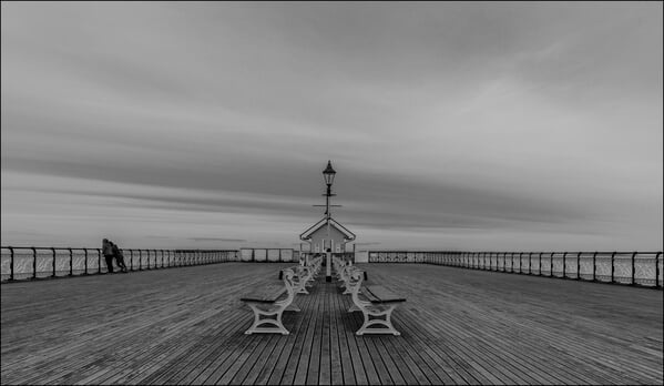 The end of the pier, towards the sea.  Taken on a bracing summers day in July!