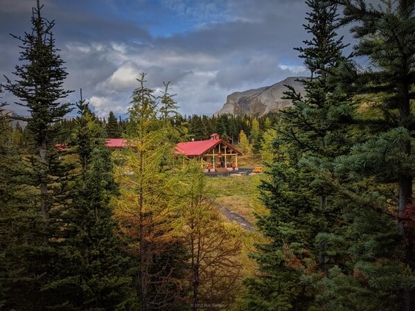 This is a view of the lodge taken from a nearby hill that provides a good position for this view as well as of the lake and mountain.