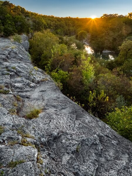 Sunset from the cliff above the river, upstream from the bend.