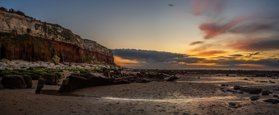 Panoramic shot during the sunset. Low tide required to go this spot.