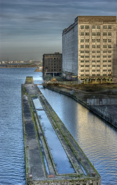Millenium Mills building and loading docks as seen from the Royl Victoria Bridge