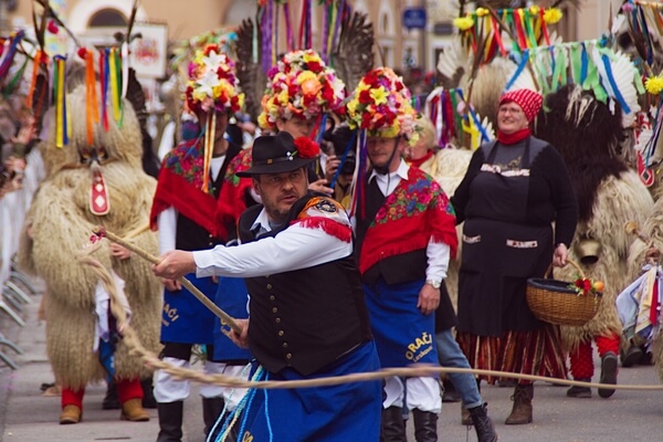 Pokači and kurenti on international carnival parade Kurentovanje, Ptuj, Slovenia