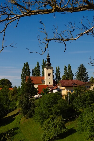Negova village with St. Mary church in summer
