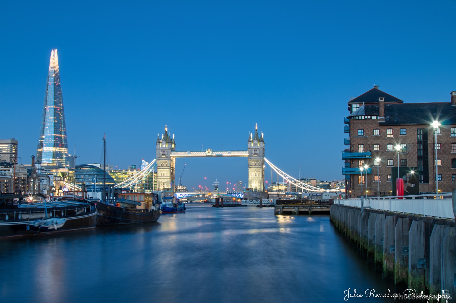 Image of View of The Shard & Tower Bridge from HMS President docks by Jules Renahan