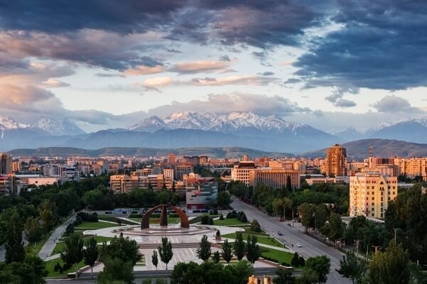 Elevated View of the center of Bishkek overlooking Victory Square with the Kyrgyz Range in the background