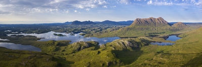 View from Stac Pollaidh looking north towards Suilven (the darker peak to the left)