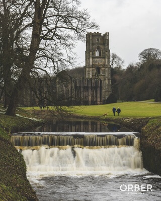 Fountains Abbey and one of its many waterfalls.