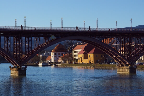 View on Lent historic quarter under the bridge in sunny winter afternoon