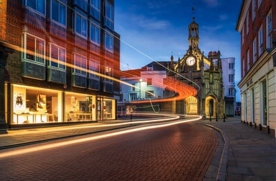Evening view of the Chichester Cross with some lovely light trails created by the buses.