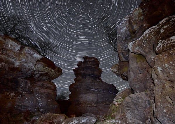 Taken over about 45 minutes on one very cold April night. Composite of 151 separate images. A foreground of the rocks, F4 ISO200 15secs plus 150 star  images at F2 ISO 1600 15secs, stacked using the "Sequator" software.