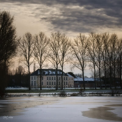 Winterview along the Dender-River between Idegem and Zandbergen. View to Beaupré abbey.