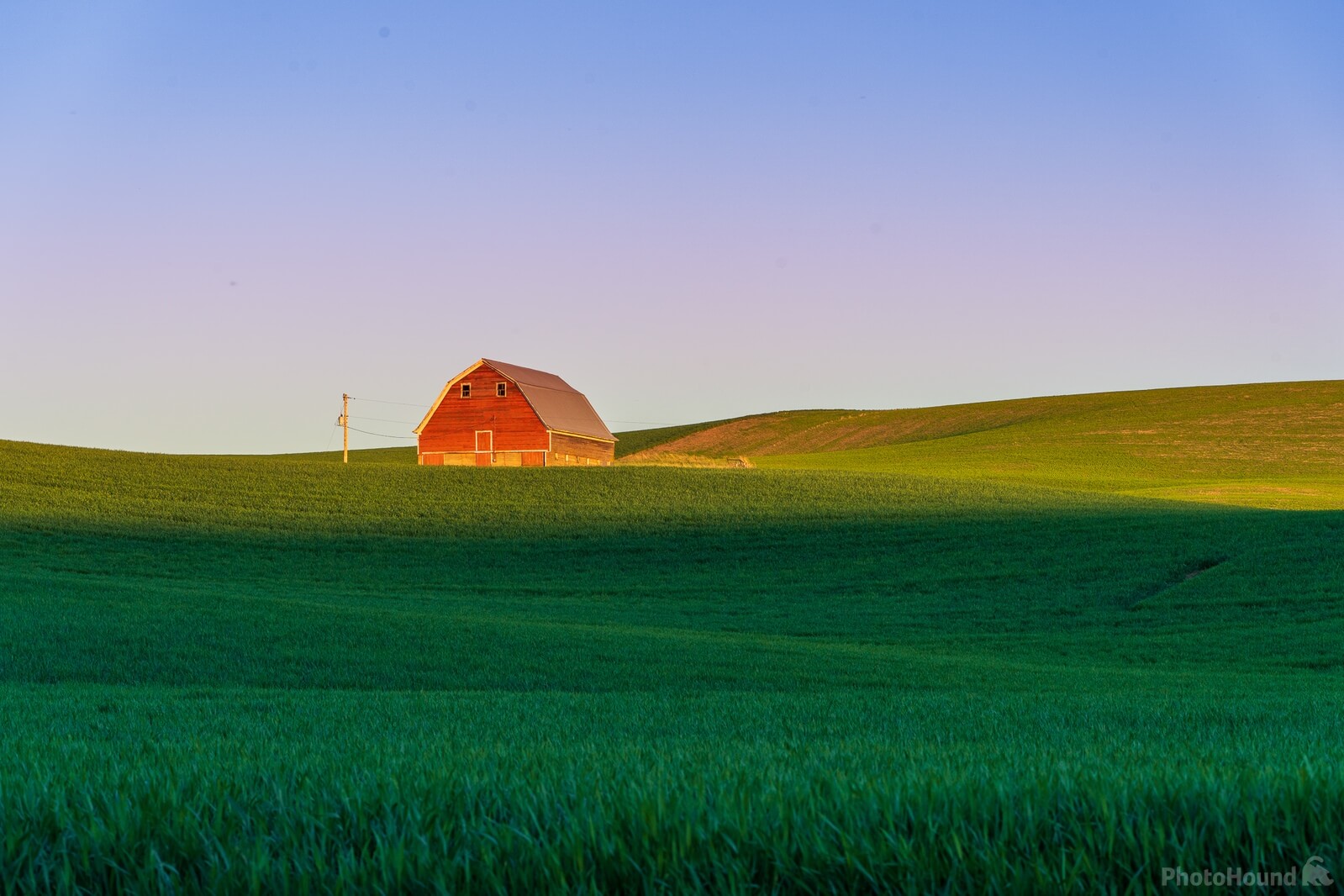 Image of Red Barn on hill above Oakesdale Road by Fang Fang