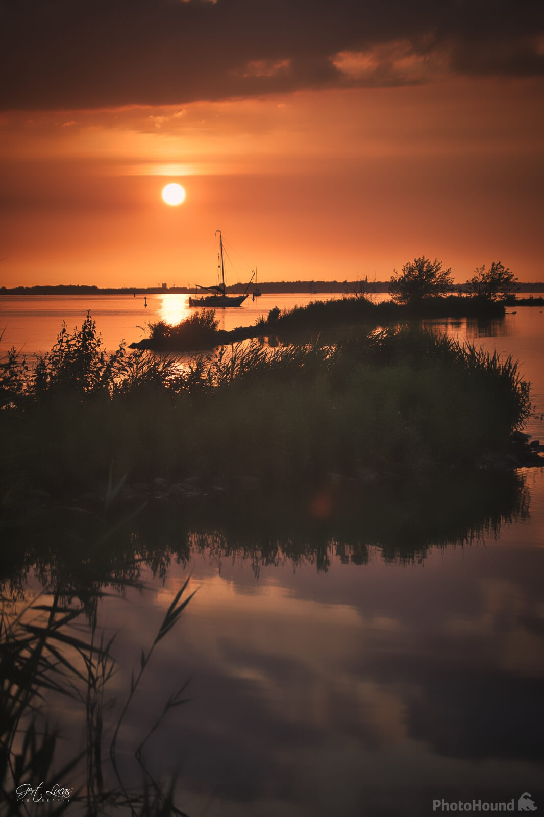 Image of Eemmeer Sunset from Eemhof Beachclub by Gert Lucas