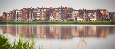 The waterfront of Spakenburg over the Eemmeer as seen from the Eemmeerdijk.