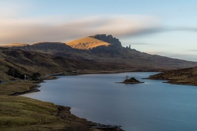 Morning view of the Old Man of Storr over the Loch Fada