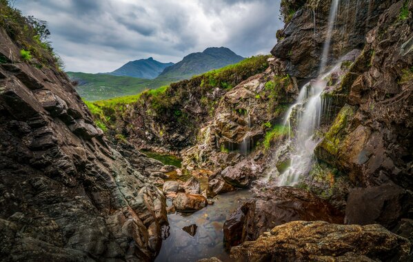 Wilde view of the Camasunary Falls and Cuillins Range.