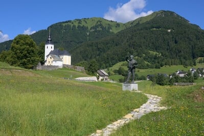 Spodnja Sorica - classic view with Lajnar, Dravh peaks, St Nicholas church and the Ivan Grohar statue - morning light