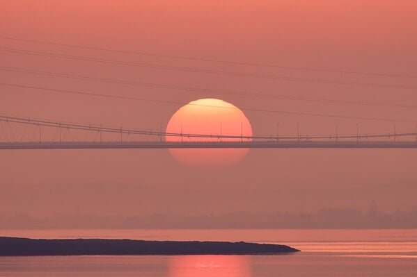 Sunrise behind the Severn Bridge