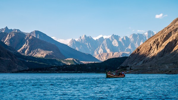 Shot from a boat riding north. In the background you can see a moutain range called Passu Cones (AKA Cathedral ridge)