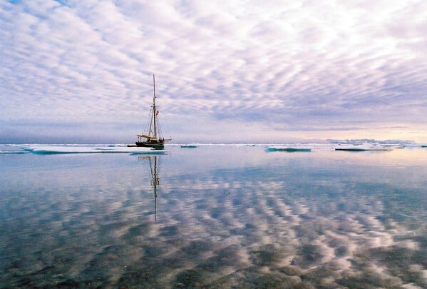 Clouds reflecting on the calm sea 
