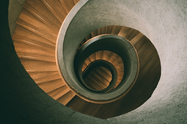 A beautiful concrete staircase found inside the building.