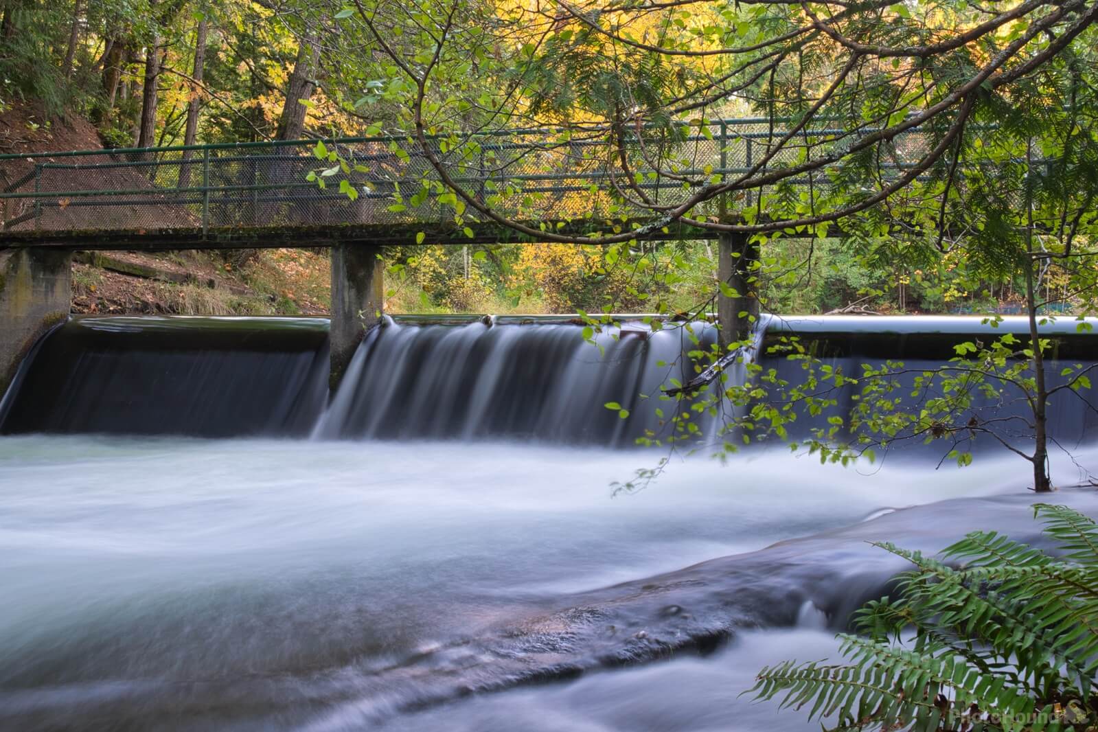 Image of Spillway with a Foot Bridge by Steve West