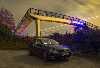 Car and footbridge 