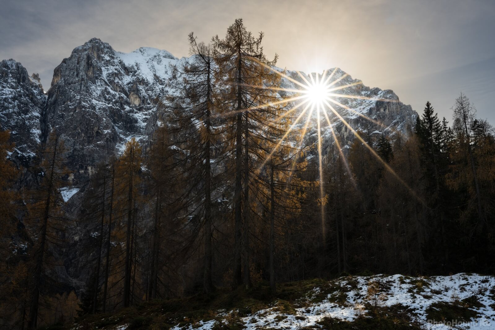 Image of Sunstar through Mt Prisojnik by Luka Esenko