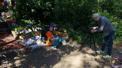 Interviewing TAG Founder Fee Warner for a forthcoming feature at Marc Bolan's Rock Shrine, Gipsy Lane, Barnes, SW15 5RG London. Photograph taken on the 16th September 2021 - The 44th Anniversary of his passing at this site. Marc's Shrine has been cared for since 1999 by TAG (T.Rex Action Group) via an in-perpetuity lease on the site. The PRS Memorial was installed in September 1997 for the 20th Anniversary. Five years later the bronze bust of Marc Bolan was installed for the 25th Anniversary. Both were unveiled by Marc Bolan's only heir Rolan Bolan who was just 10 days short of his second birthday when his dad died. That fateful night Rolan was asleep at his paternal grandparents home in Putney. Marc and his partner, Rolan's mother were on their way home at 142 Upper Richmond Road West, Sheen.  