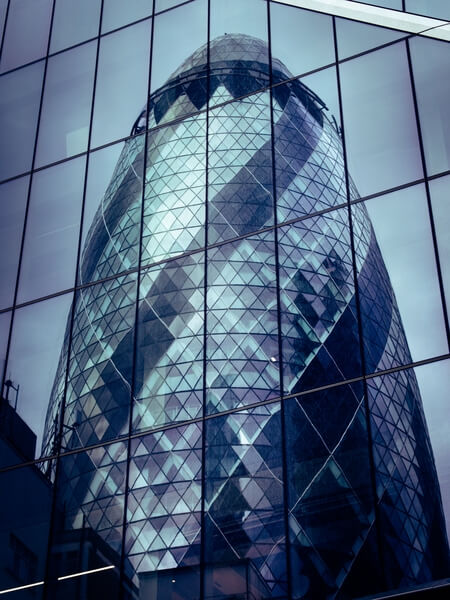 Reflection of the iconic Gherkin in a nearby building.