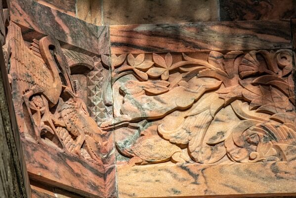 Wall carvings include illustrations of Aesop's Fables.