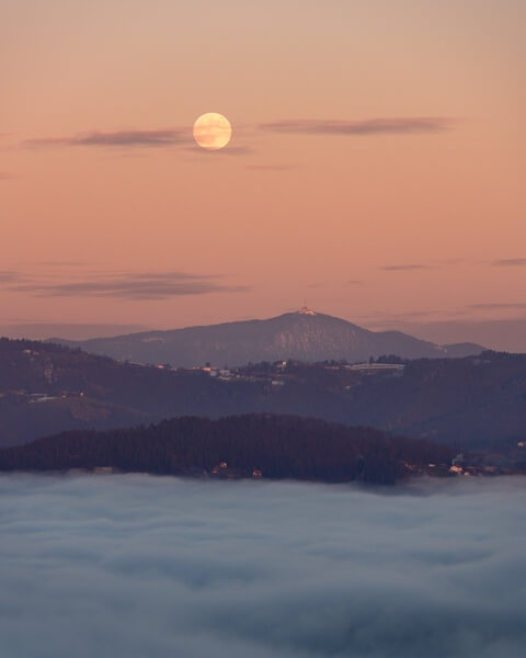 Full moon rising above Mt Kum
